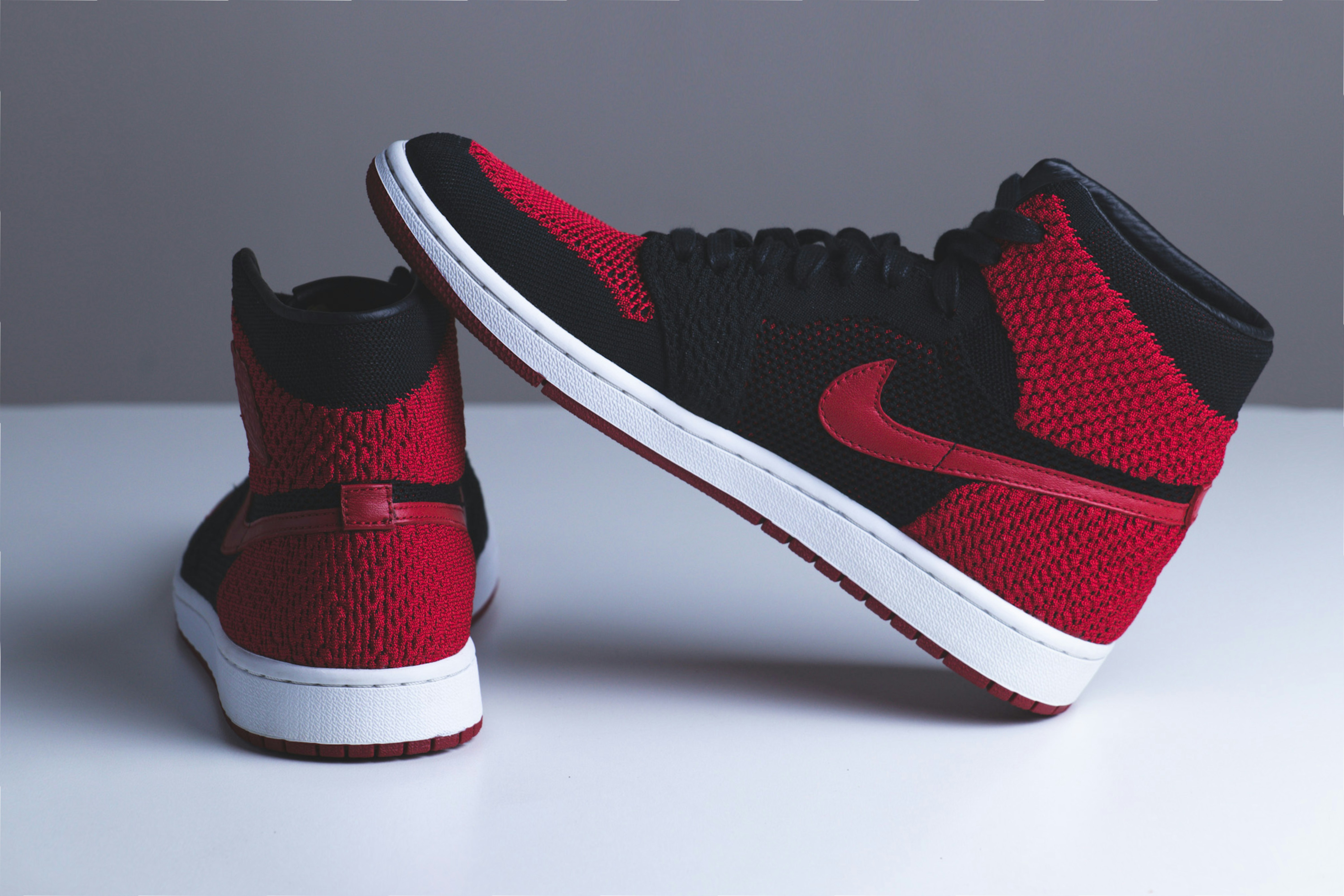 red and black high top nikes