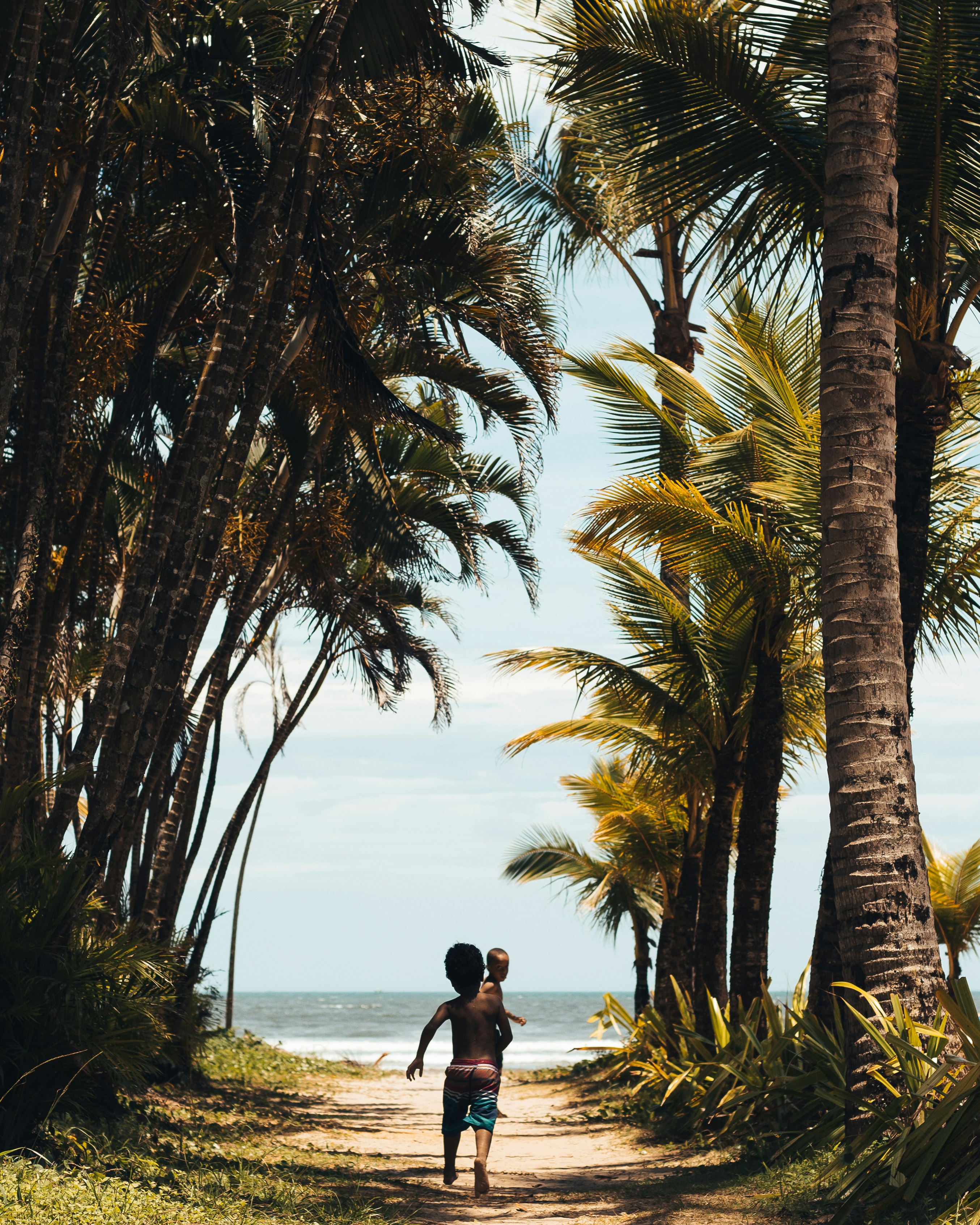 boy running to beach