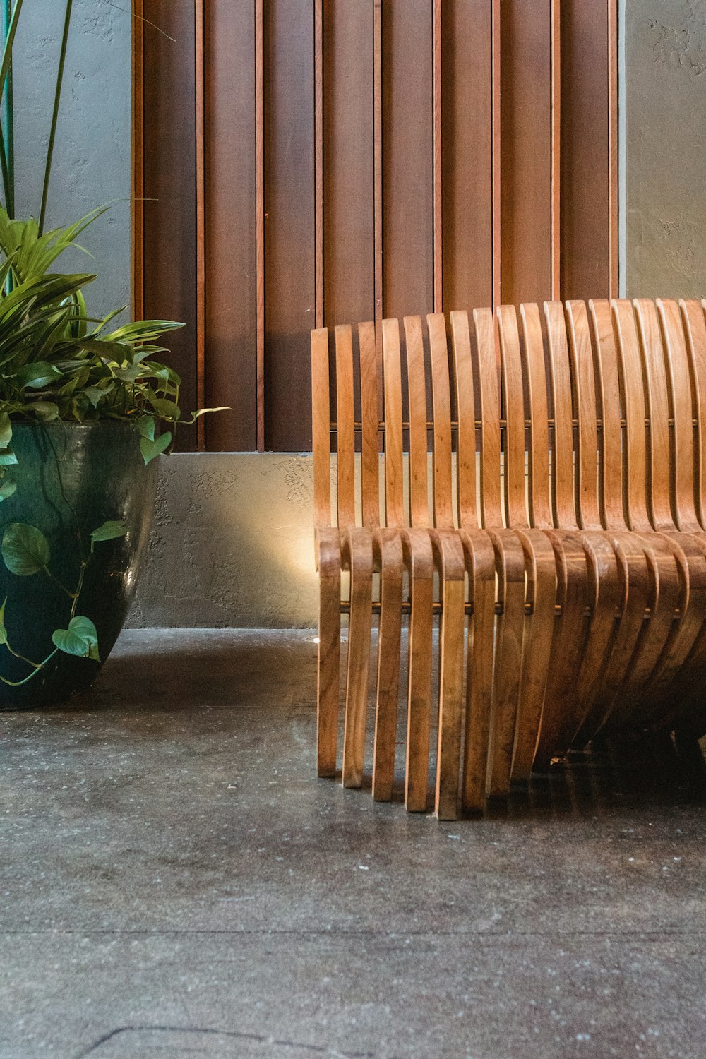 brown bench beside window