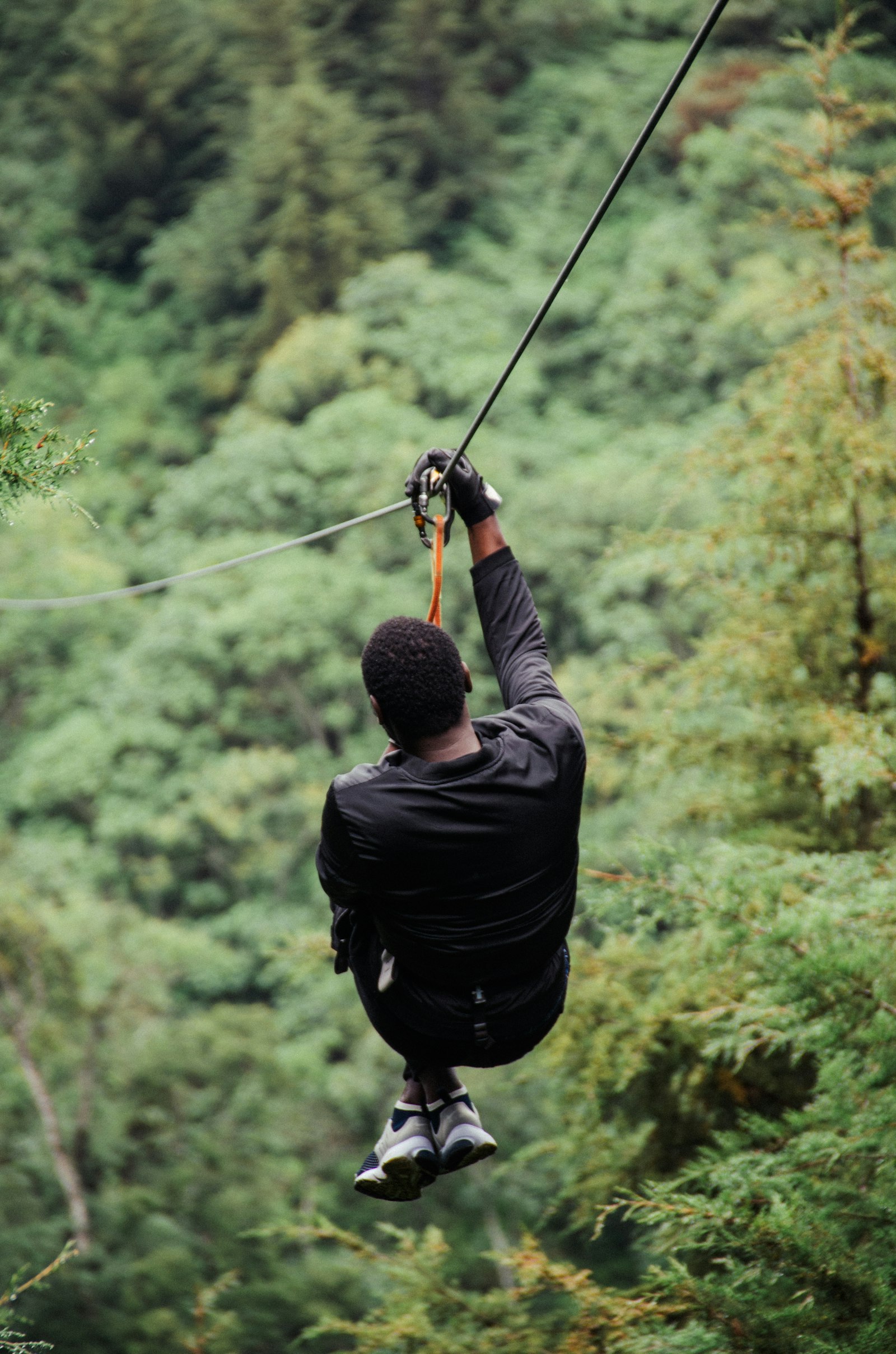 Nikon D7000 + Sigma 18-200mm F3.5-6.3 II DC OS HSM sample photo. Man on cable rope photography