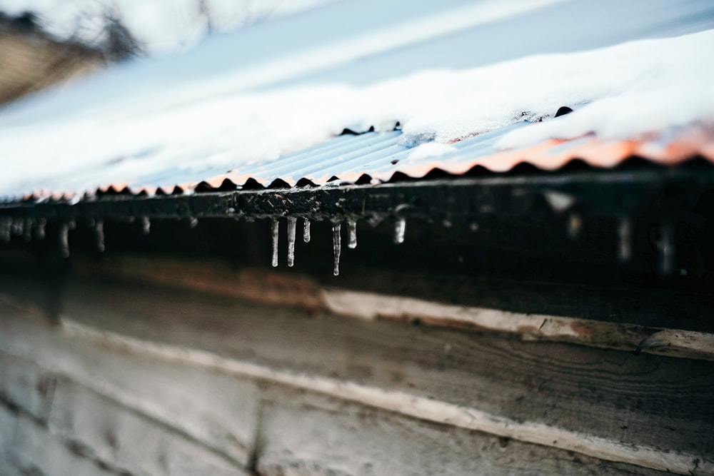 icicles hanging from the roof of a house