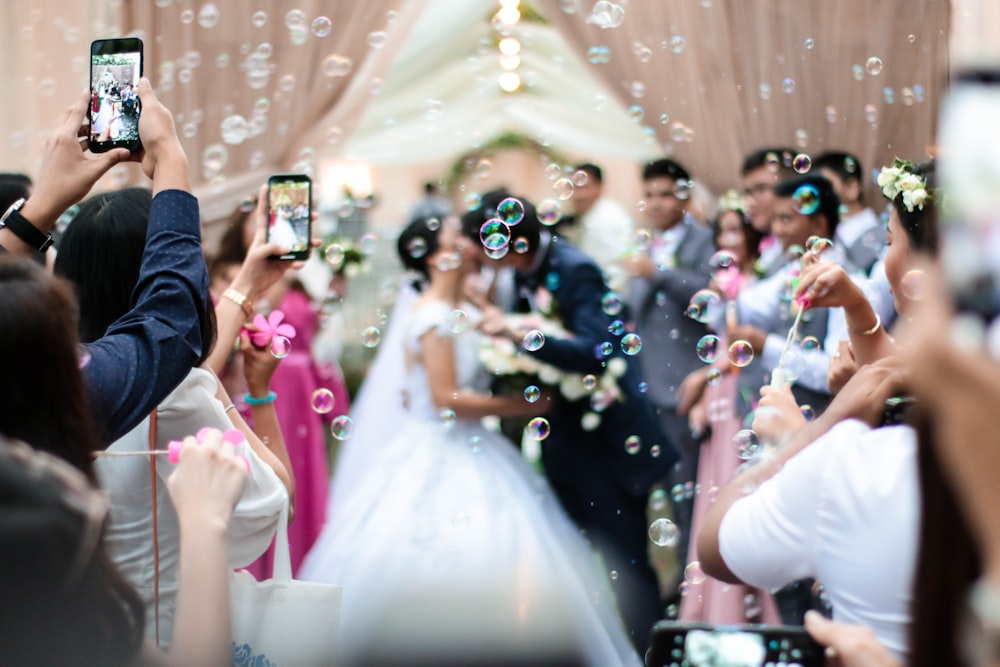 shallow focus photo of man and woman kissing