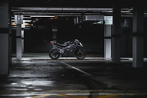 black sports bike parking in garage area