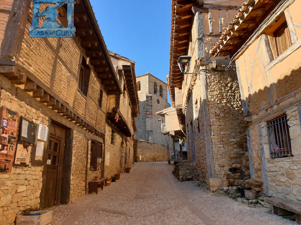 road between buildings during day