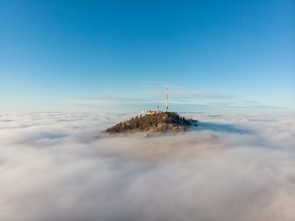 brown mountain under cloudy sky