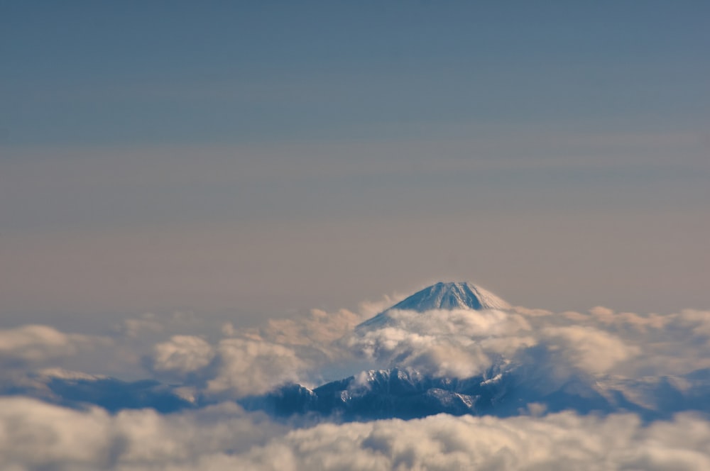 clouds and mountain during day