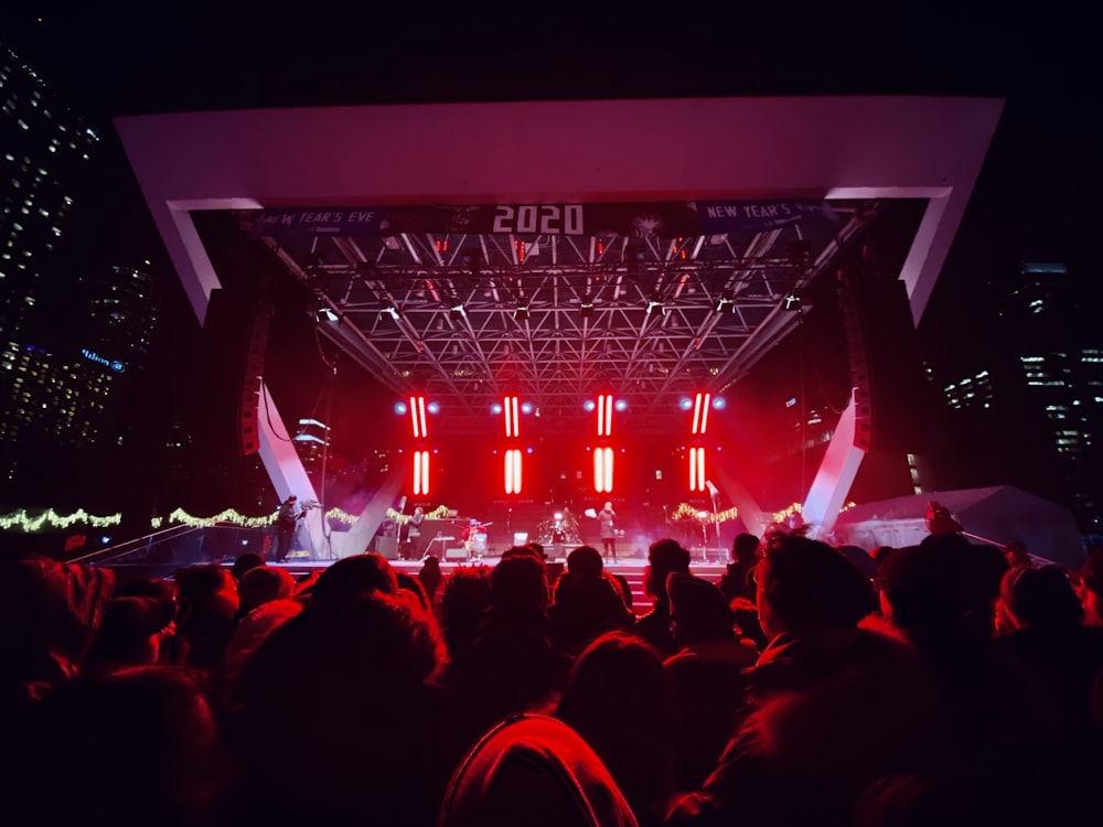 photography of people watching concert during nighttime