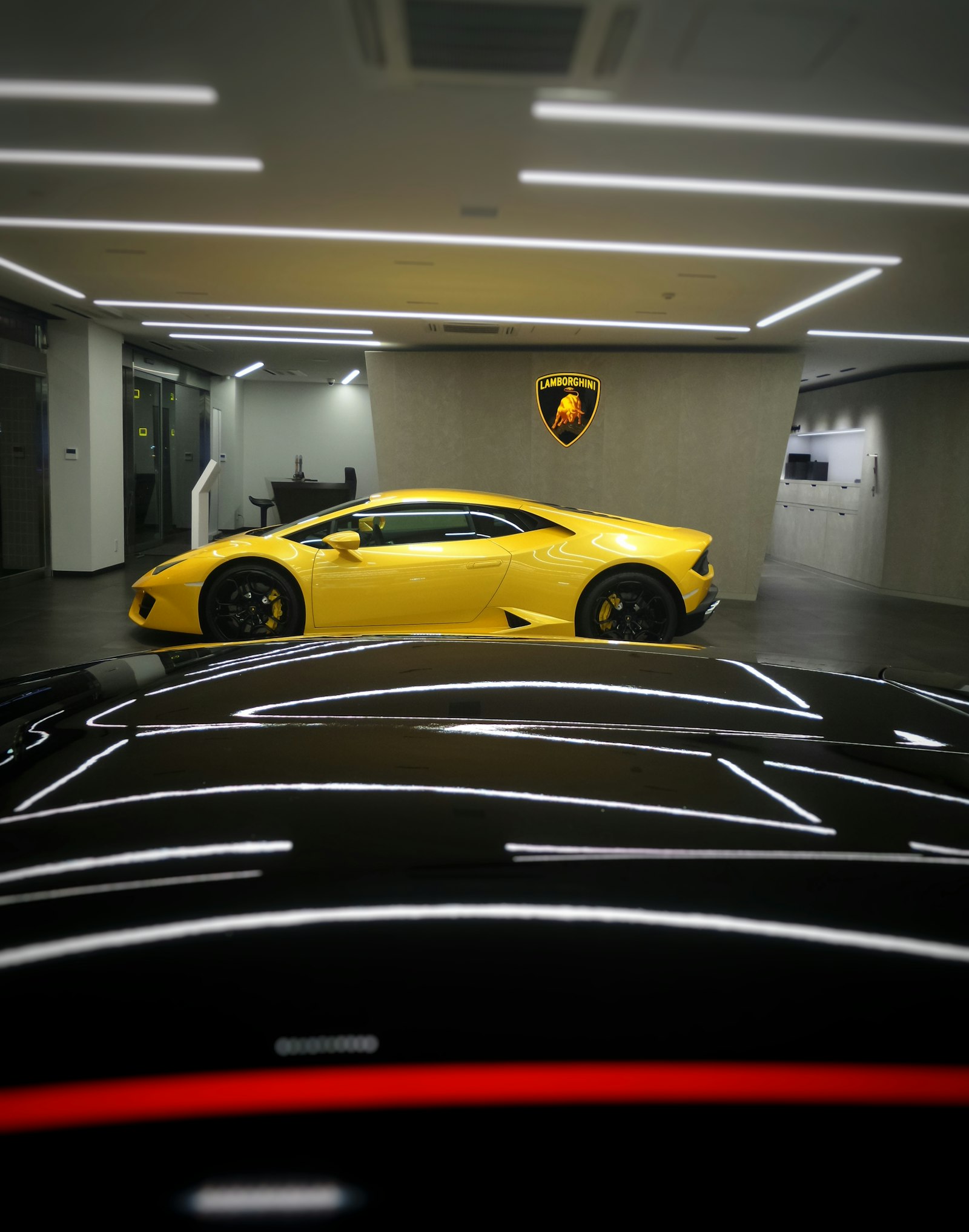 Samsung Galaxy K Zoom sample photo. Yellow coupe parked indoors photography