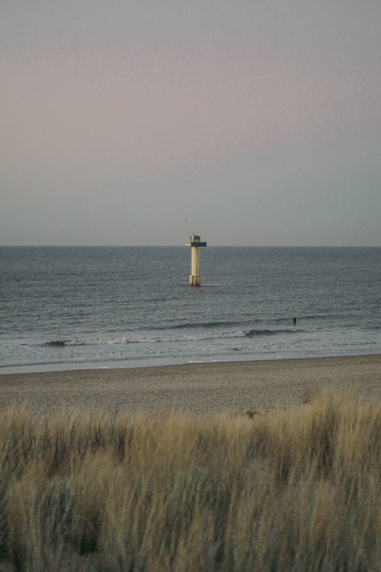 shallow focus photo of lighthouse in Cadzand Netherlands