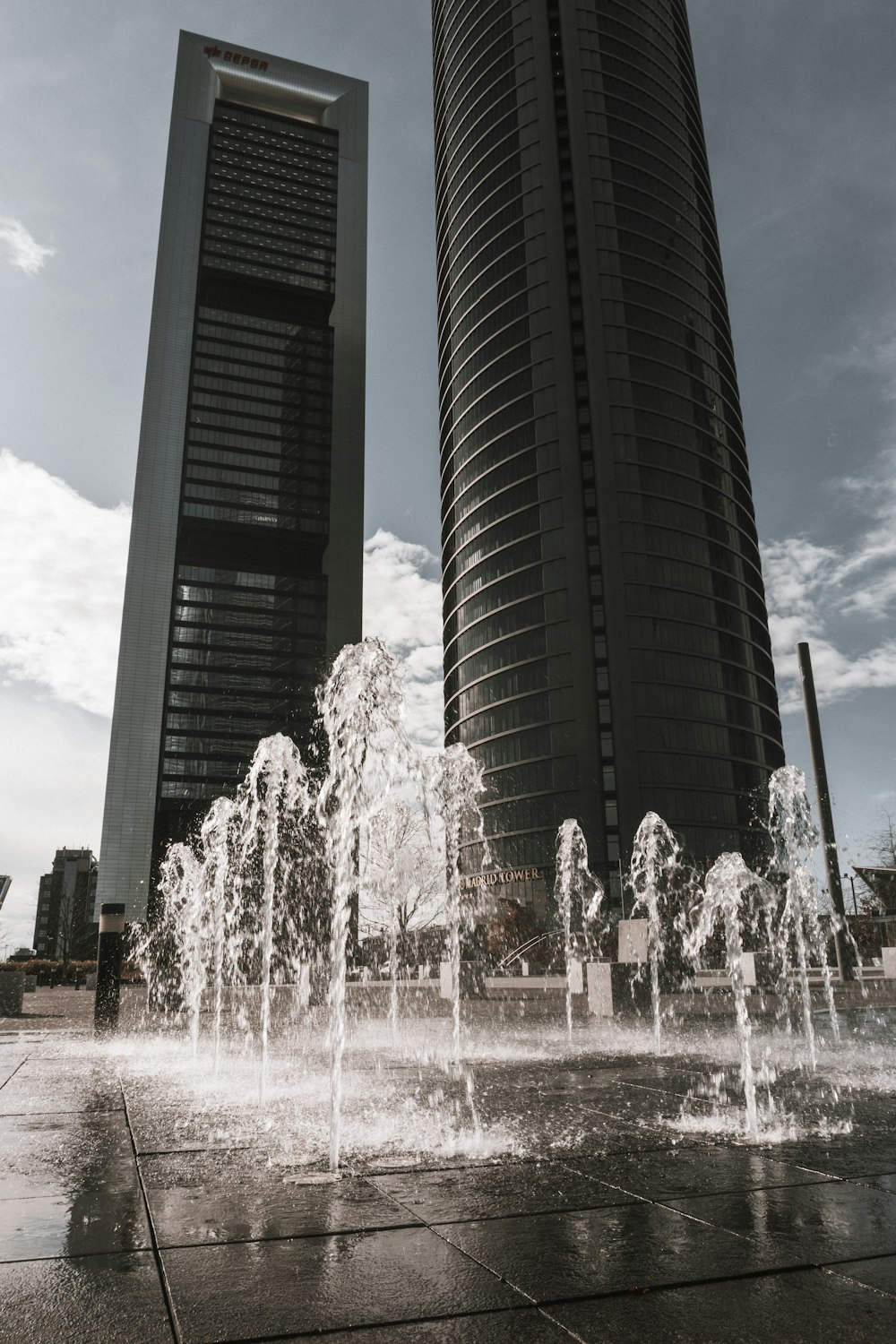 water fountain in front of building during daytime