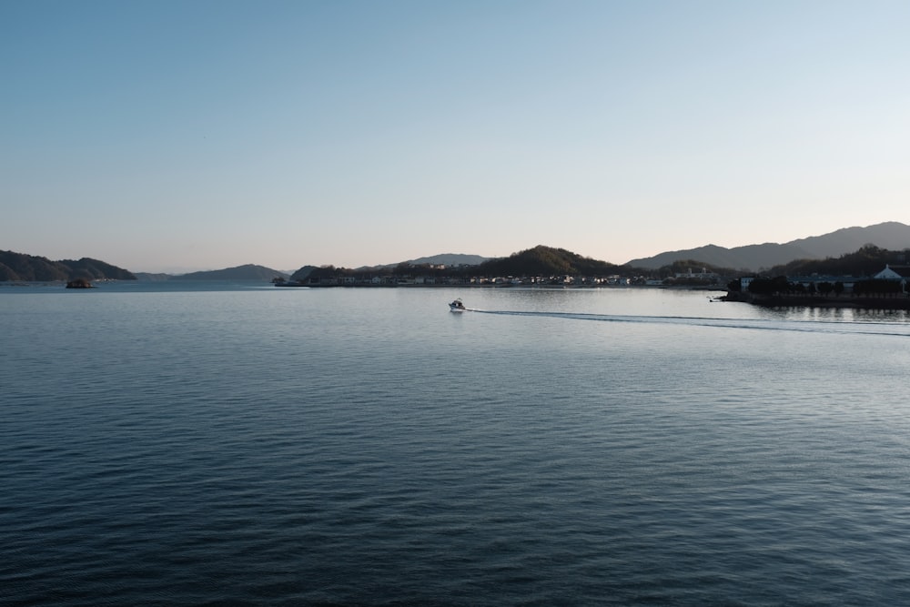 calm body of water during daytime