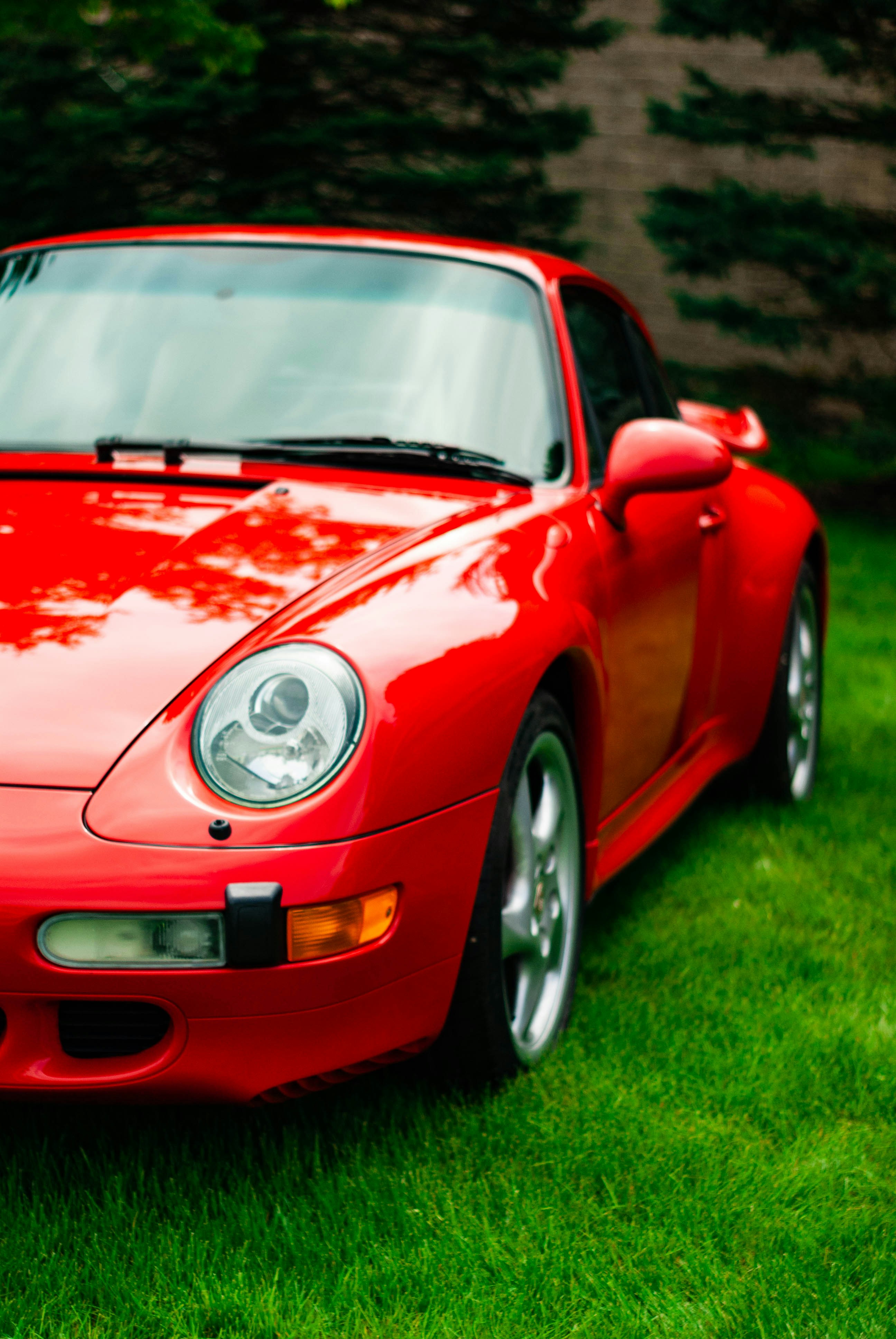 Red coupe photo Free Grand rapids Image on Unsplash