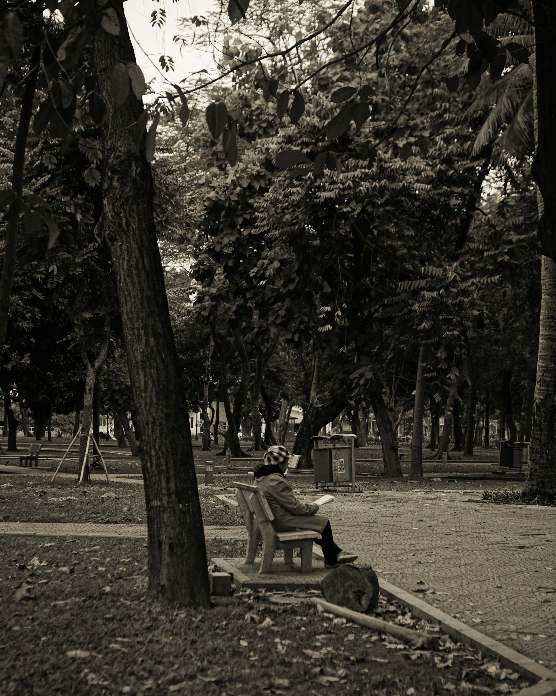 woman wearing yellow long-sleeved dress under white clouds and blue sky during daytime