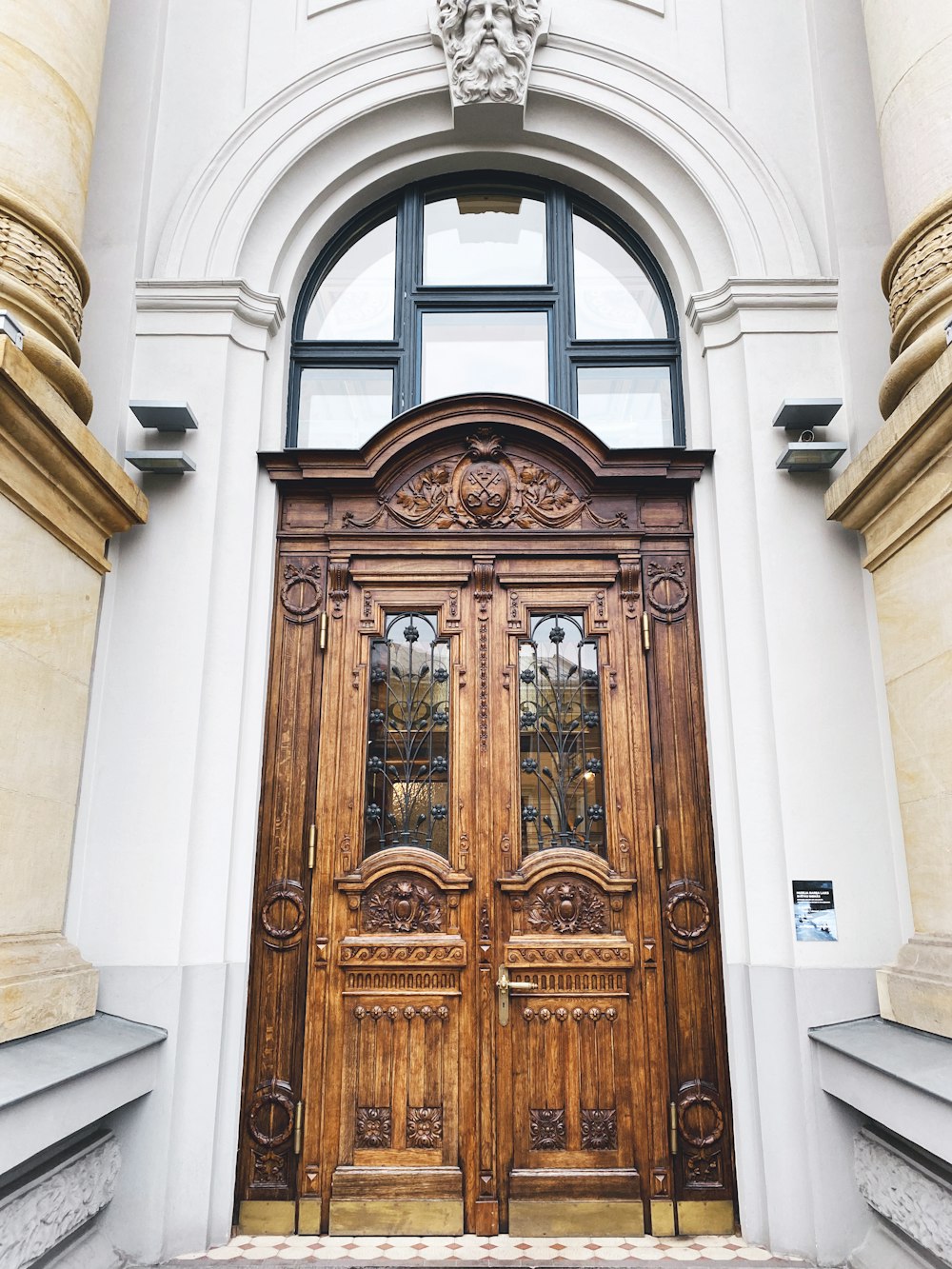 brown wooden framed glass door