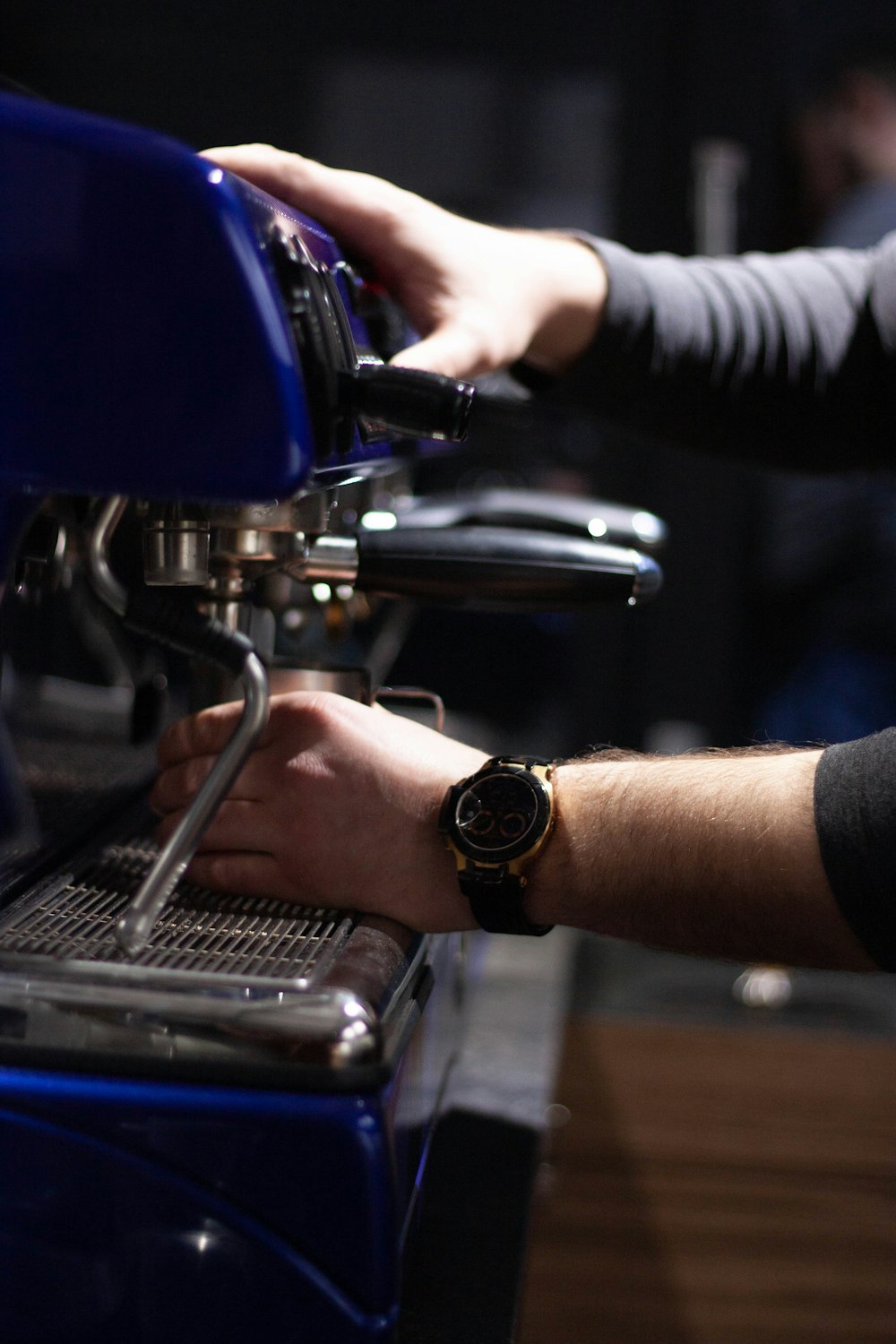 man using espresso machine