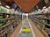 A cozy liquor store aisle filled with various bottles of spirits and snacks.