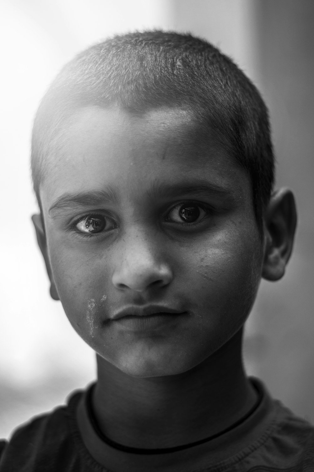 grayscale photography of boy