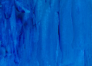 a painting of blue paint on a wall