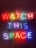 Neon lights form the words 'WATCH THIS SPACE' with each letter in vibrant, bold colors against a dark background. The glow of the neon creates a lively and eye-catching effect.