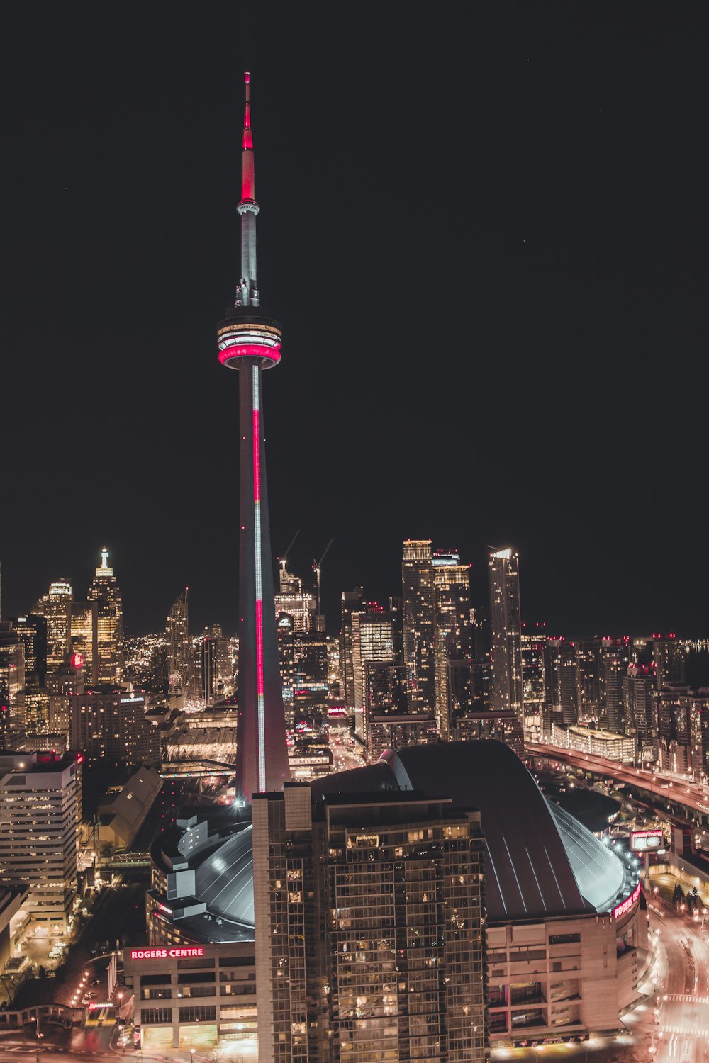 gray and red tower at night