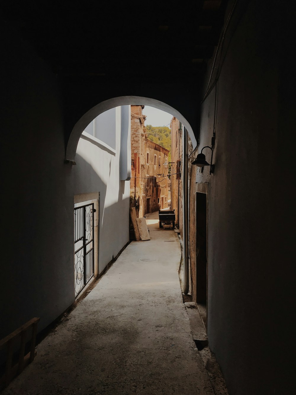 empty pathway near tunnel