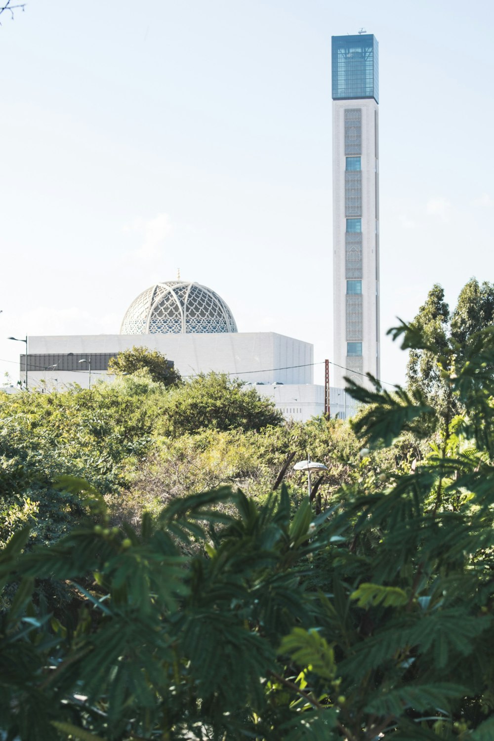 dome building beside a high-rise building during daytime