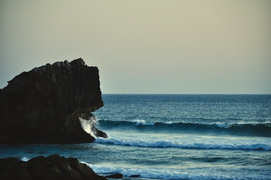 coastal stack during daytime in Sagres Portugal