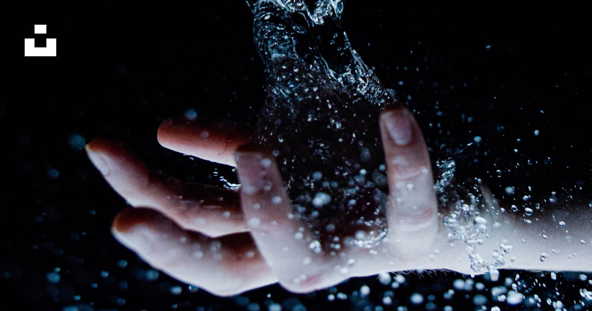 Time lapse photography of water exploded on person's palm photo – Free ...