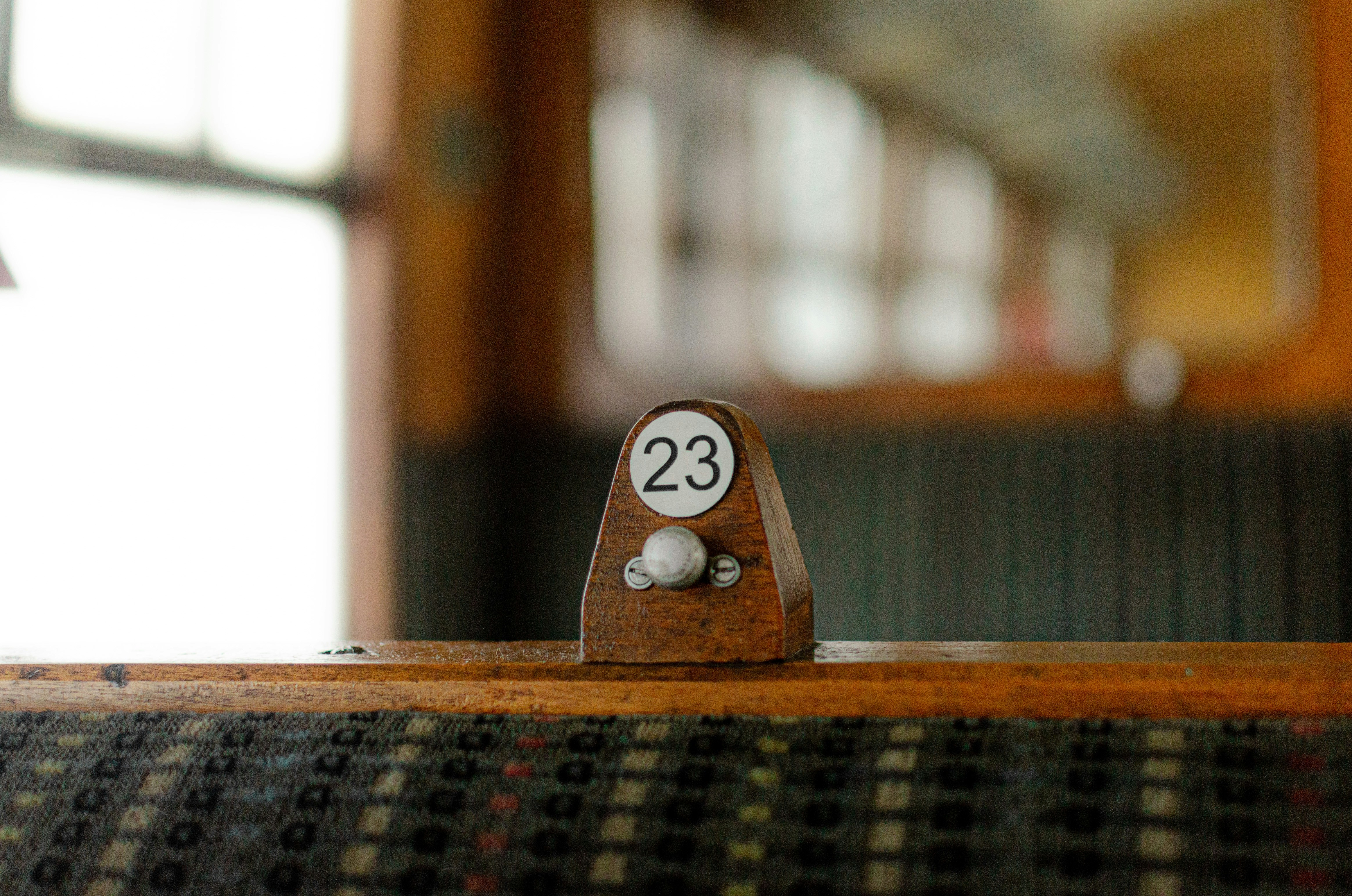 Selective focus photography of brown wooden 23 number signage photo ...
