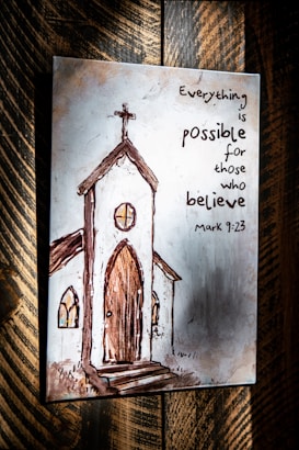 Illustration of a rustic church with a cross atop, featuring arched windows and a wooden door. The artwork is complemented by an inspirational quote from Mark 9:23 in a handwritten style, set against a textured background.
