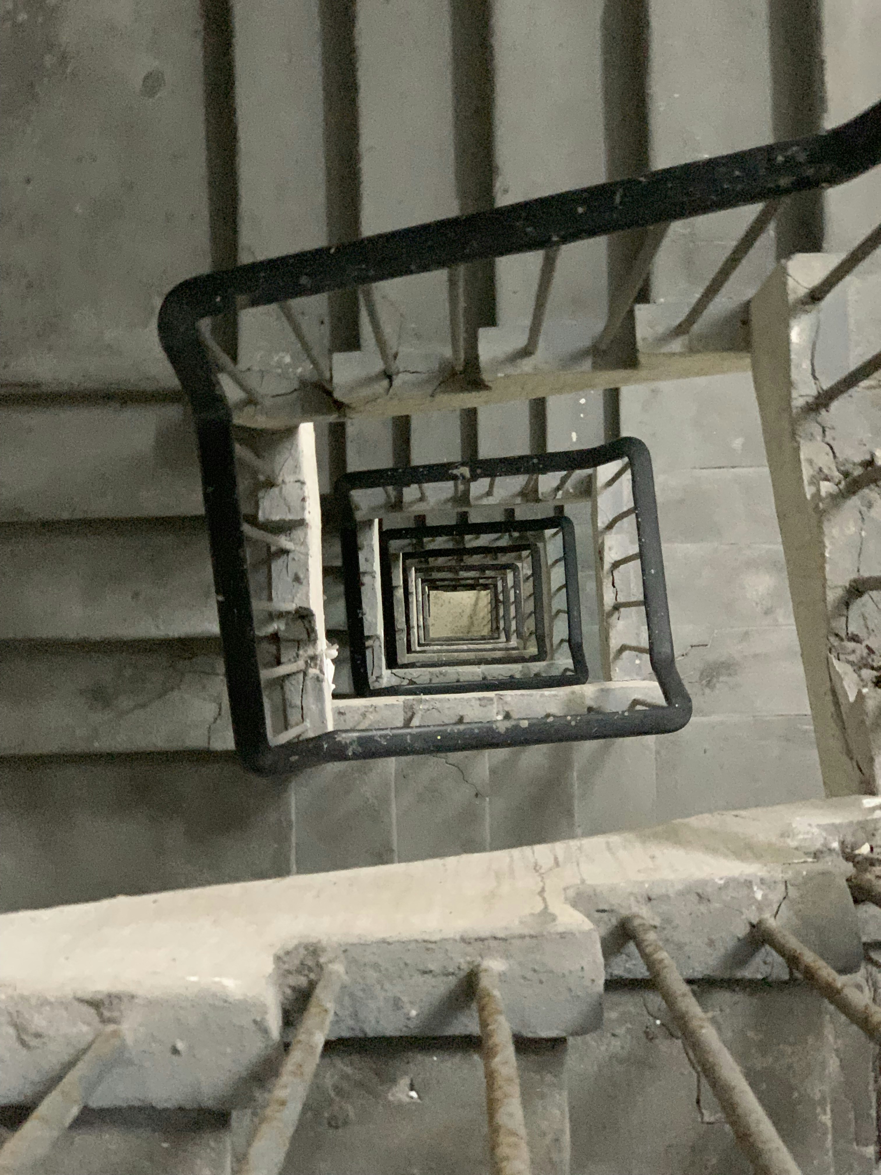 gray concrete spiral staircase