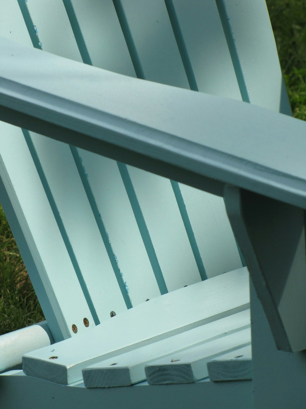 gray wooden adirondack chair