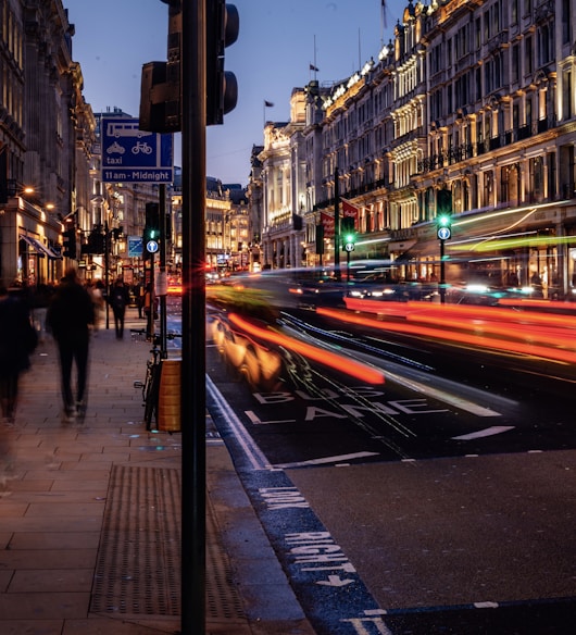 time lapse photography of vehicles on road