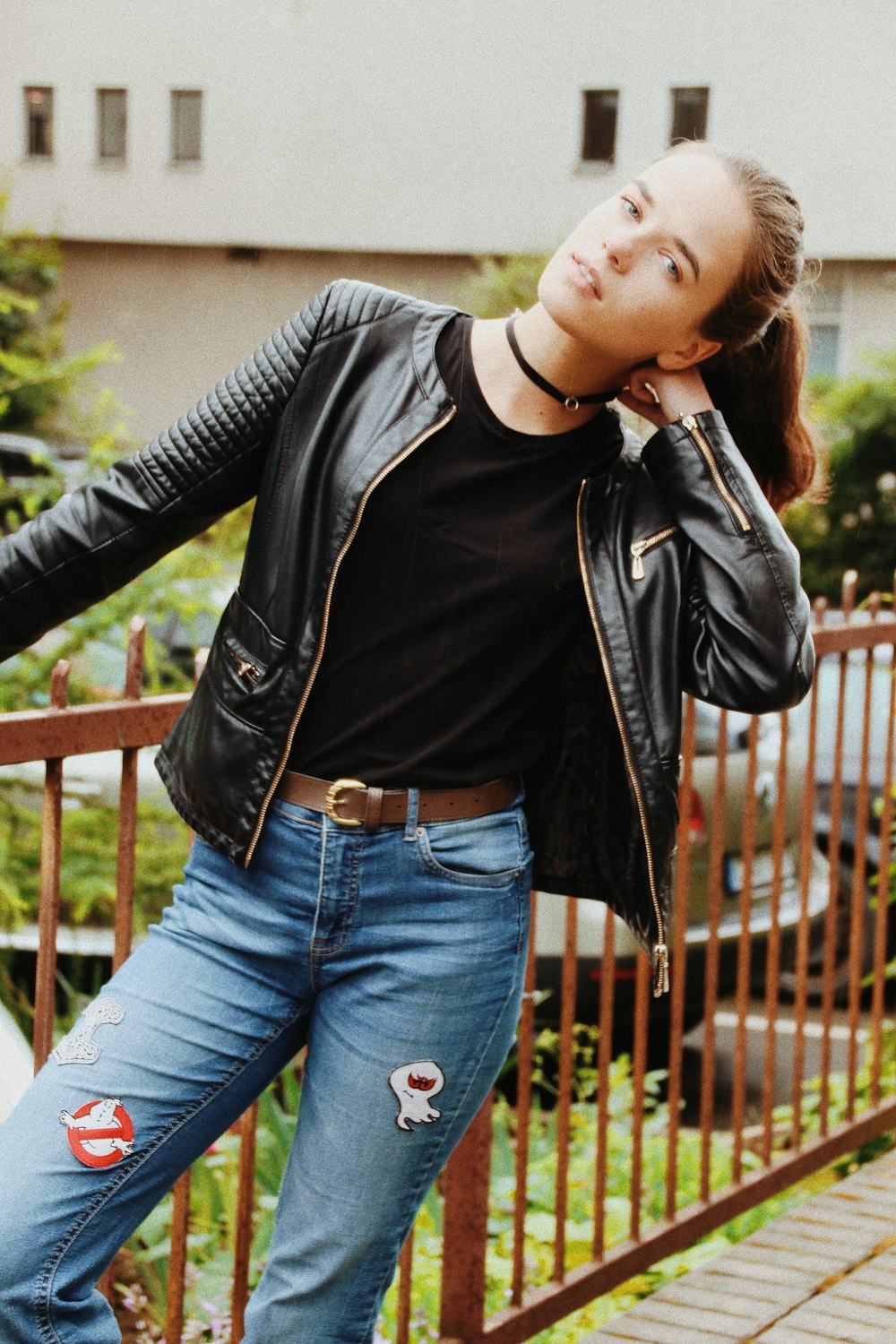 shallow focus photo of woman in black leather full-zip jacket