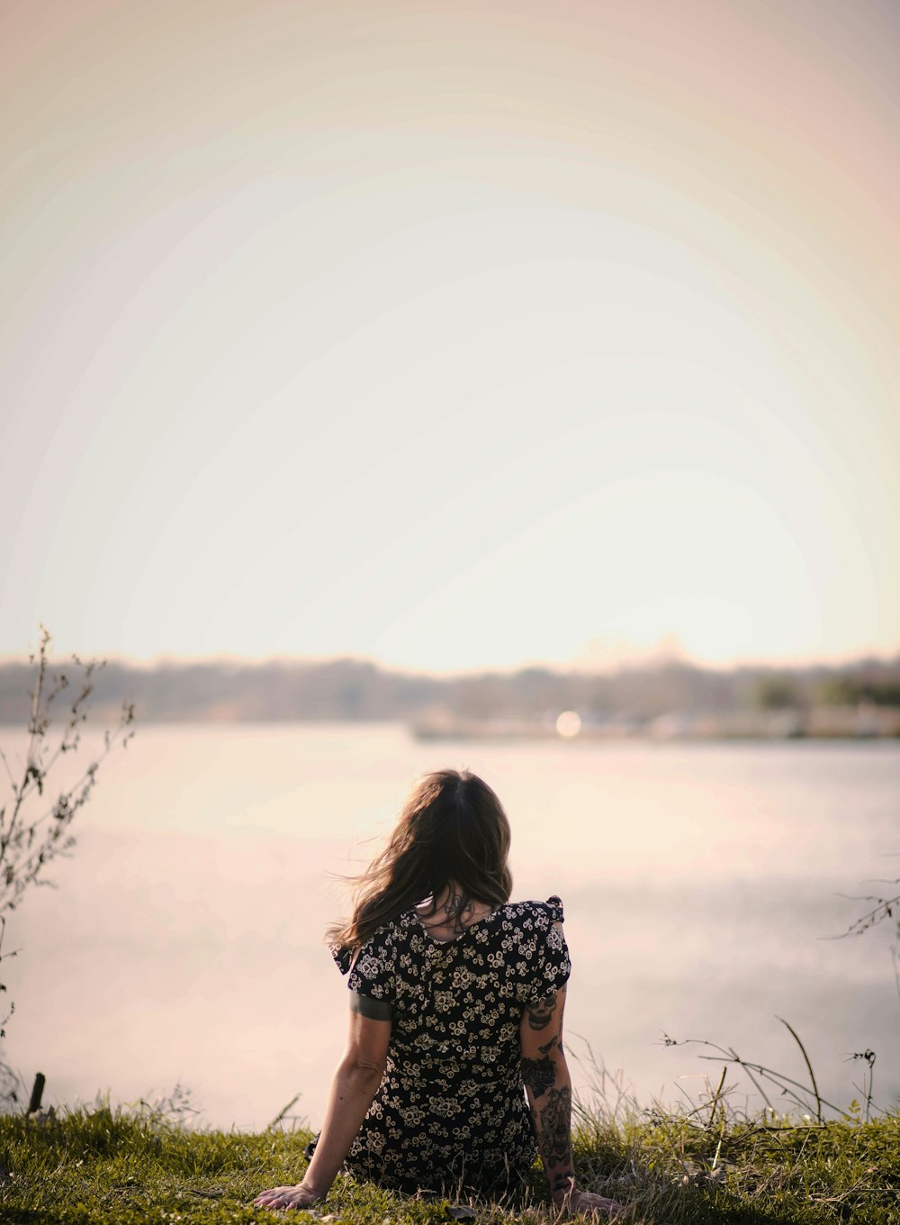 woman wearing black and white floral dress