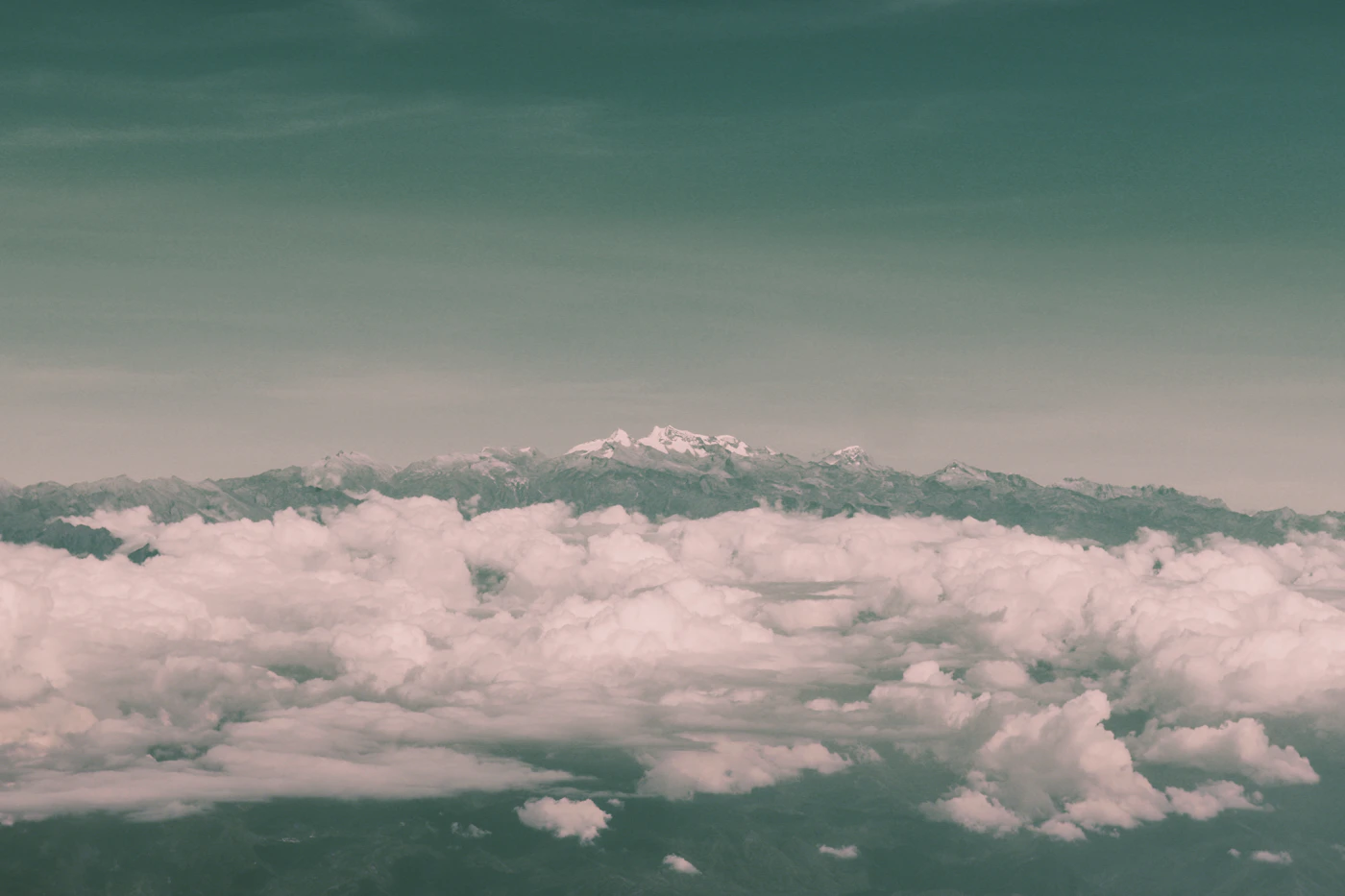 The snow-capped peak of the Sierra Nevada de Santa Marta rising above the clouds