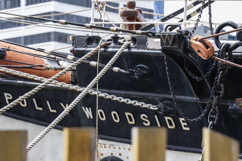 a close up of a boat tied up to a dock