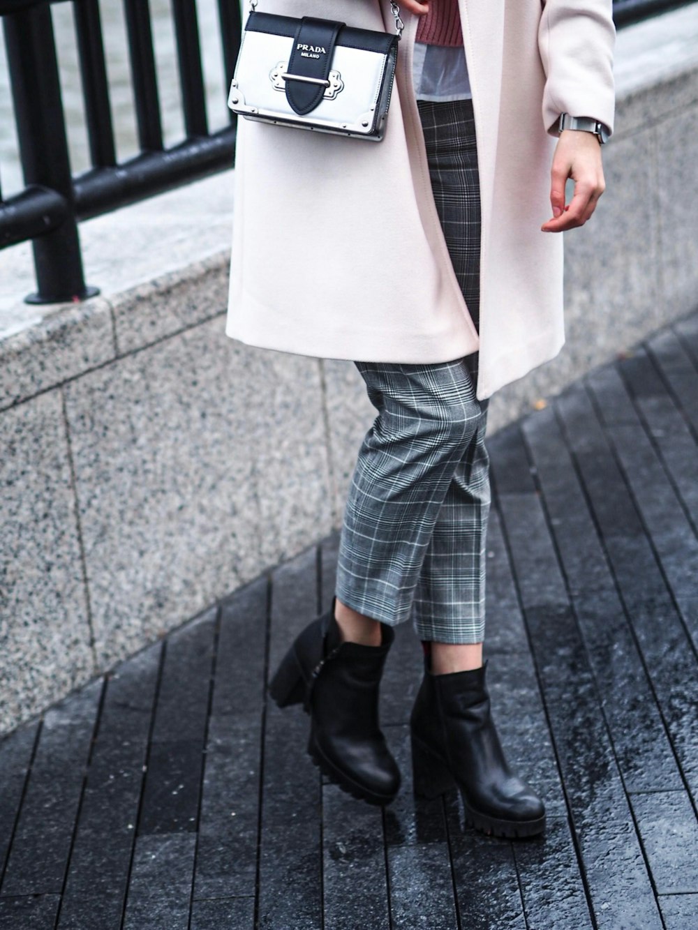 woman in black leather boots