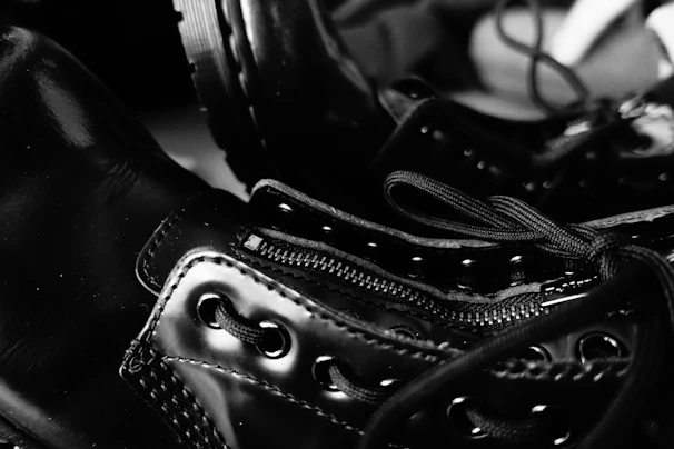 Before and after comparison of a restored leather boot showing remarkable transformation