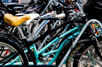 line of parked bikes during day