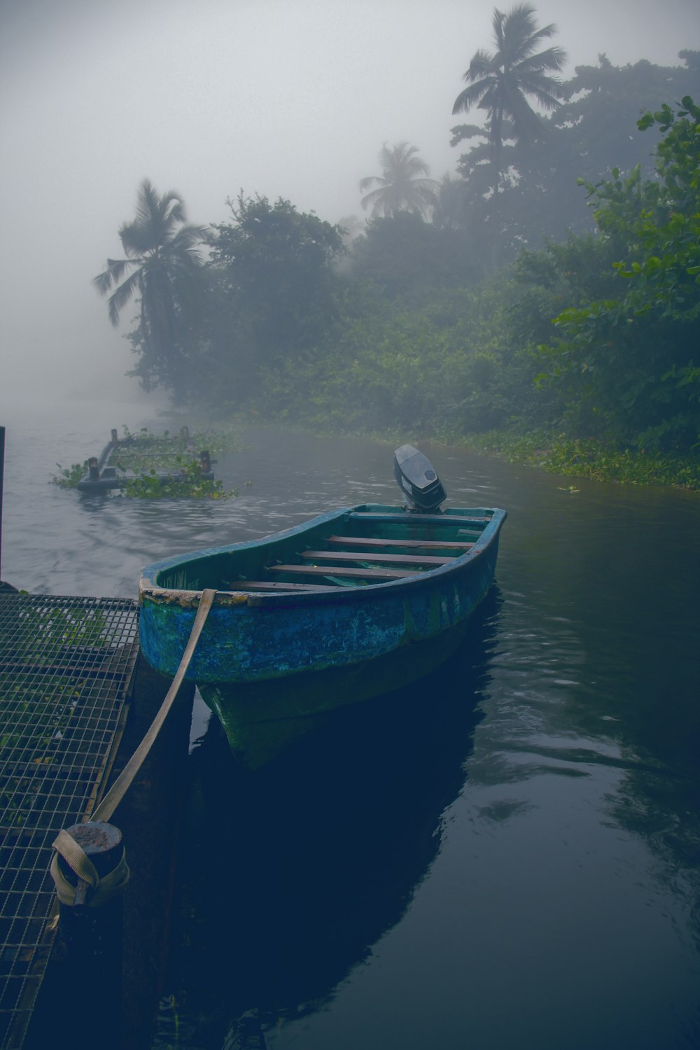 blue boat on lake