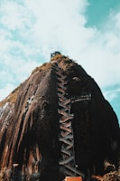 mountain under cloudy sky