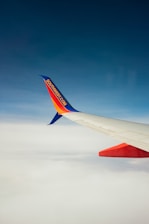 white, red, and blue Southwest airplane