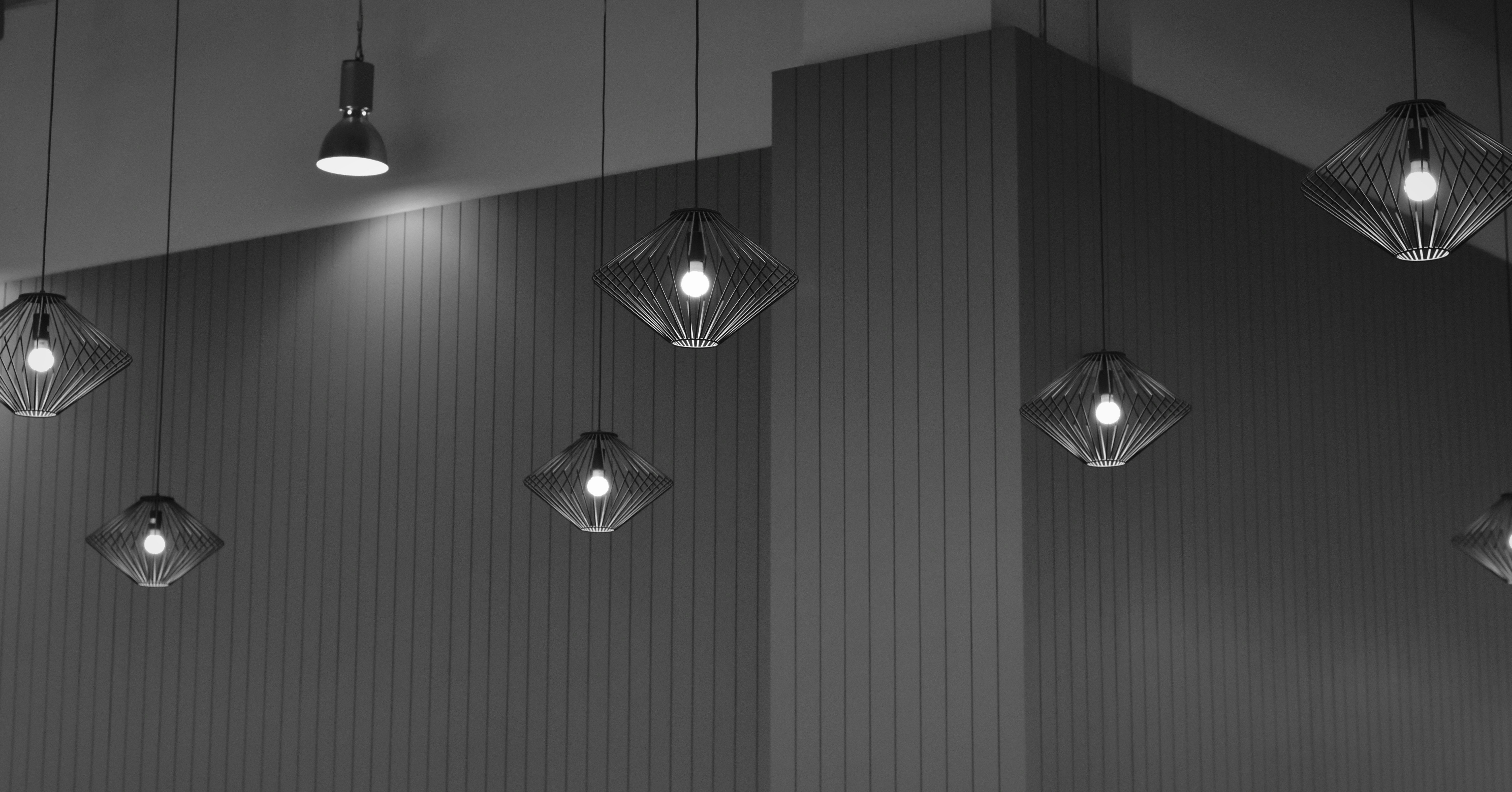 Minimalist modern space with symmetrical light fixtures.