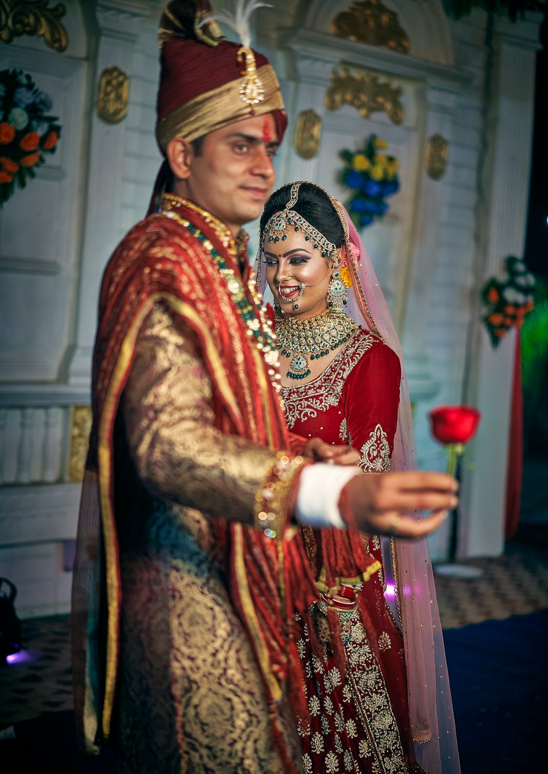 wedding couple in red dress