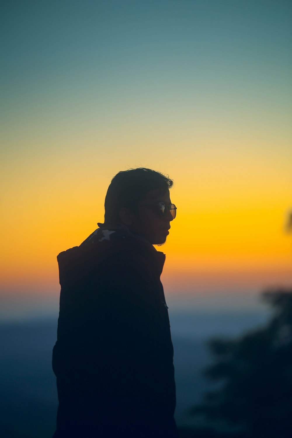 man standing near tree