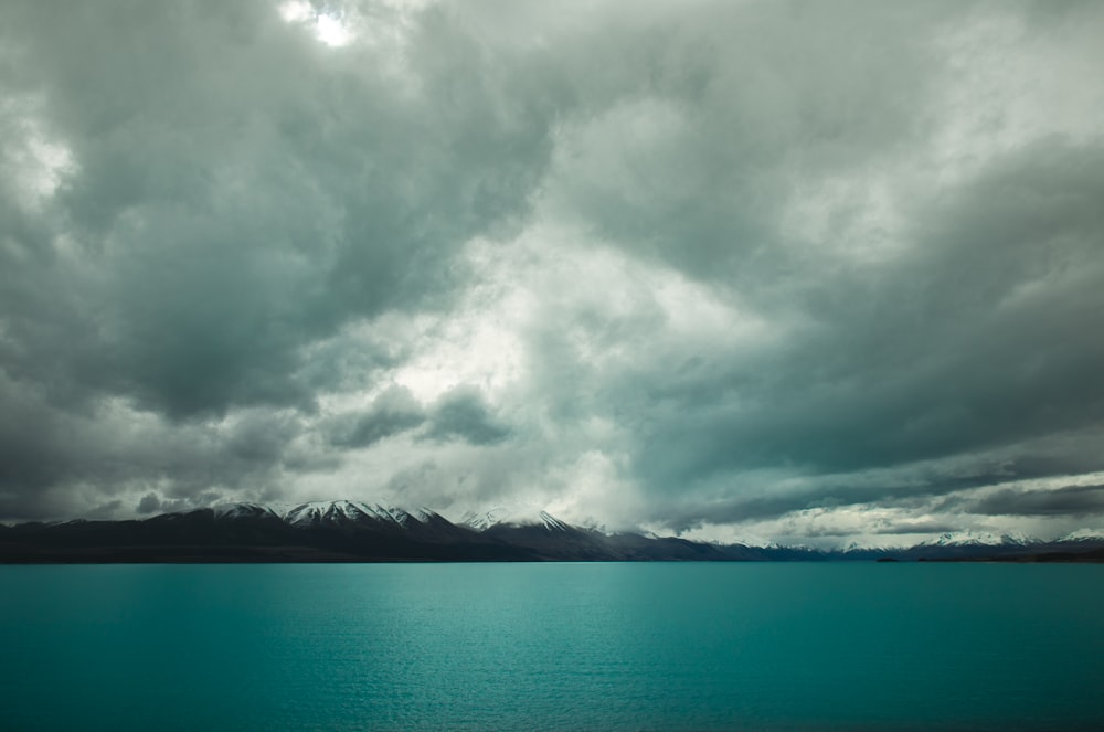 white clouds over water