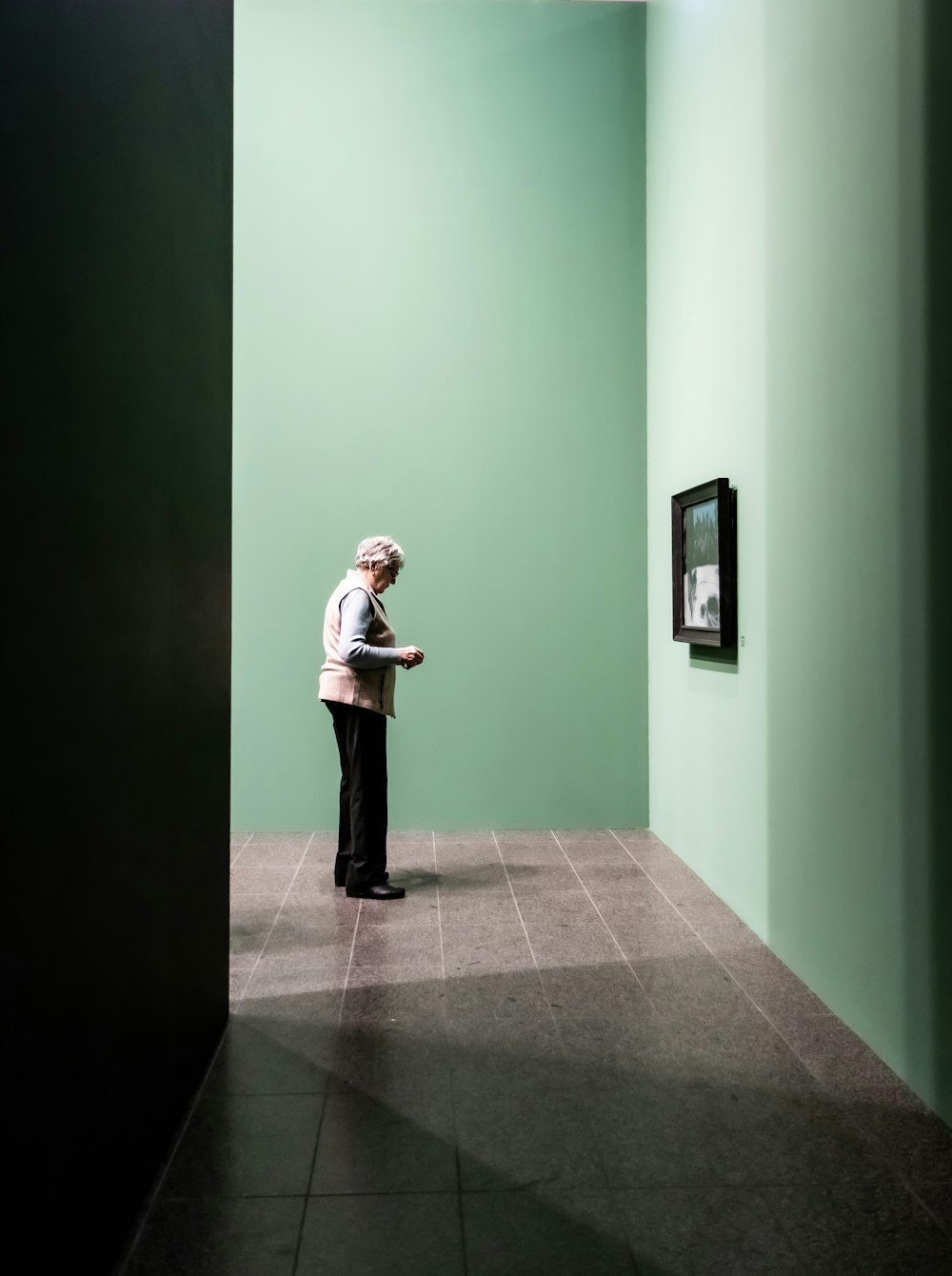 woman standing in well-lit room