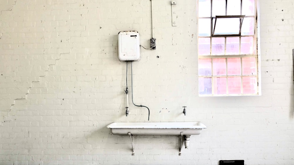 rectangular white sink with faucet