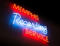 Behind-the-scenes glimpse of Memphis preparing notes before a session.